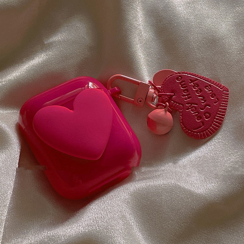 Étui de protection rouge rose pour écouteurs Bluetooth sans fil, design compact avec fermeture sécurisée"