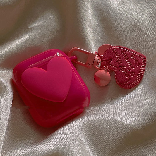 Étui de protection rouge rose pour écouteurs Bluetooth sans fil, design compact avec fermeture sécurisée"